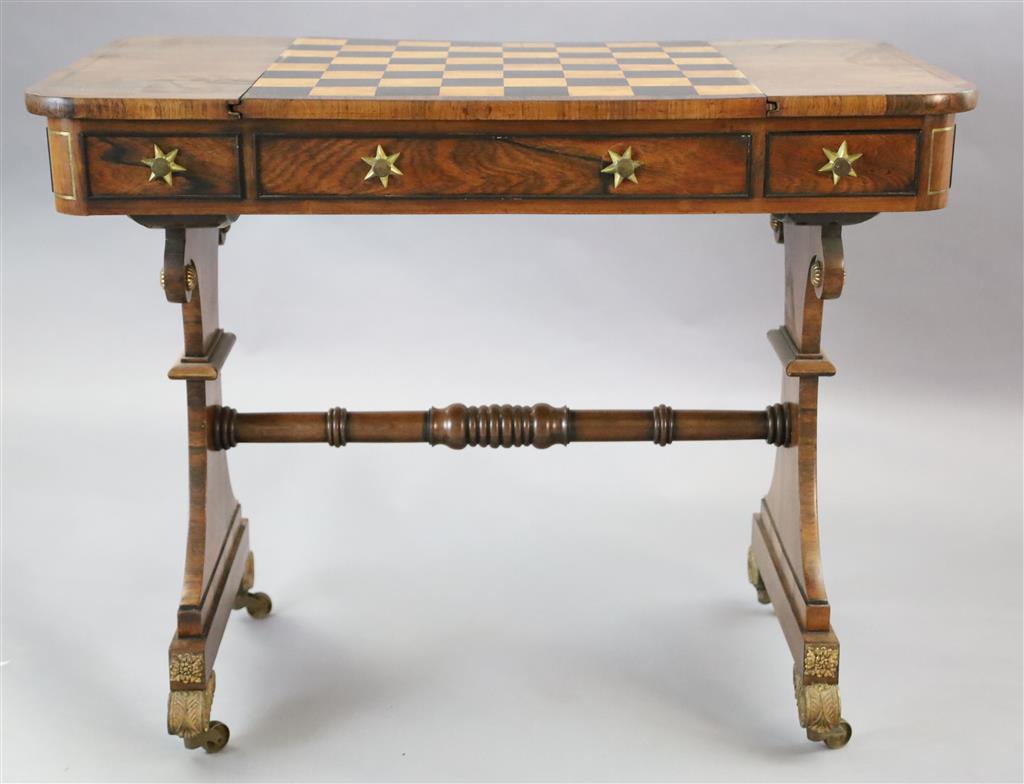 A Regency brass strung rosewood games table, W.3ft D.1ft 9in. H.2ft 5in.